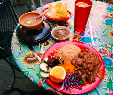 The Little One signature dishes Barbacoa de Res
Conchinito en Chile Colorado
Plato Surprise Plate